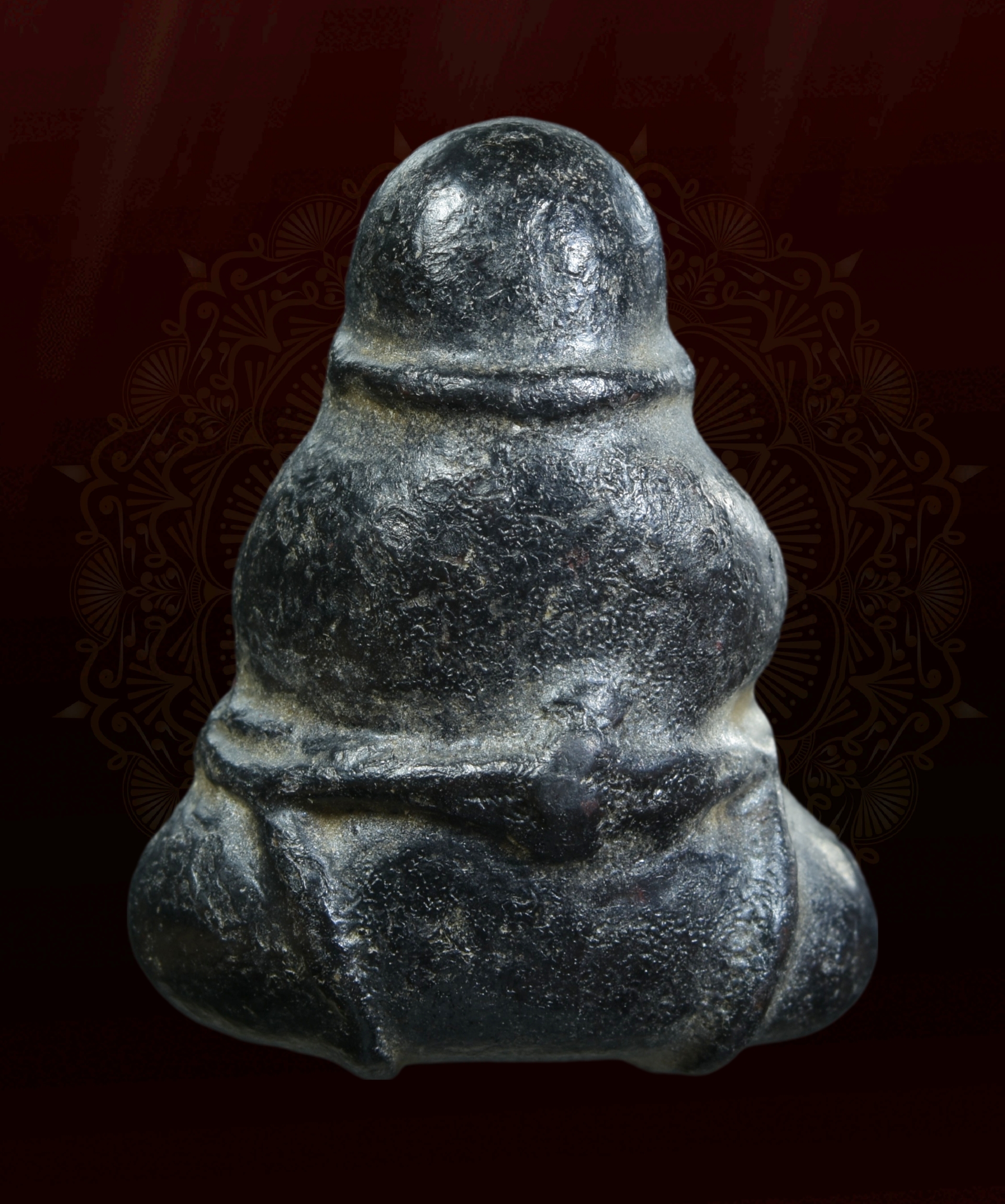 พระปิดตาผูกเชือก เนื้อผงคลุกรัก