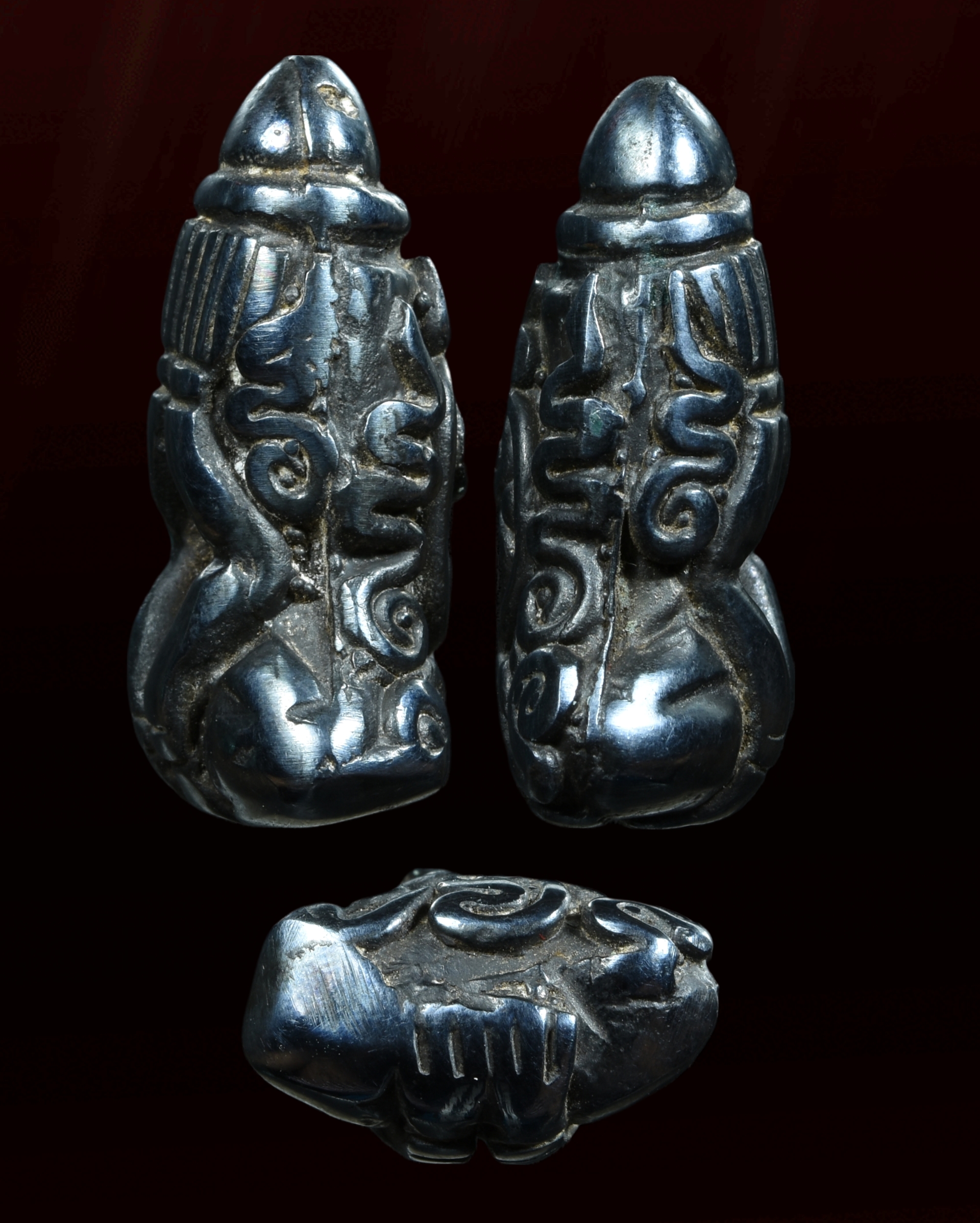 พระปิดตาสี่กร เศียรแหลม เนื้อเมฆพัตร