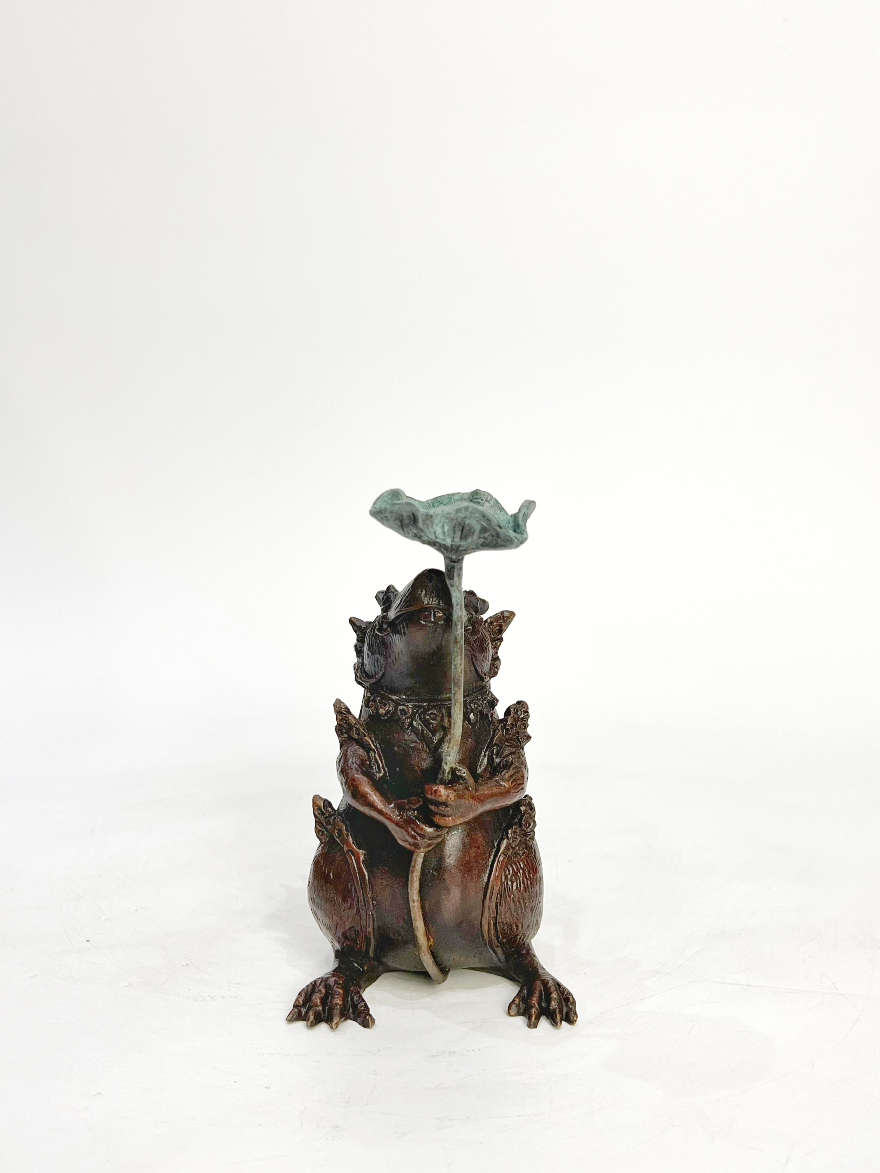 หนูมุสิกะ (ถือใบบัว วางกำยาน)