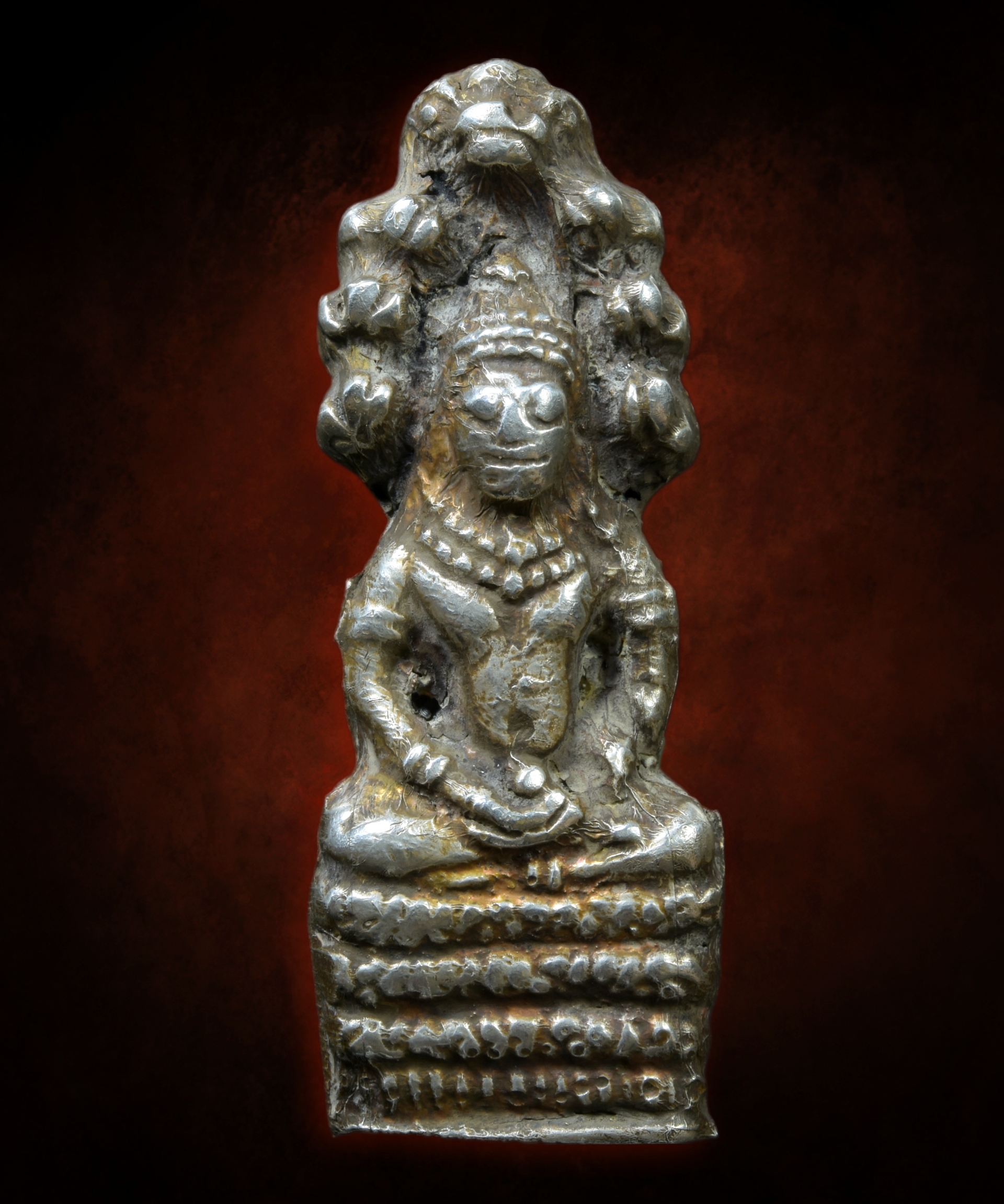 พระปางนาคปรก เนื้อว่าน บุเงิน