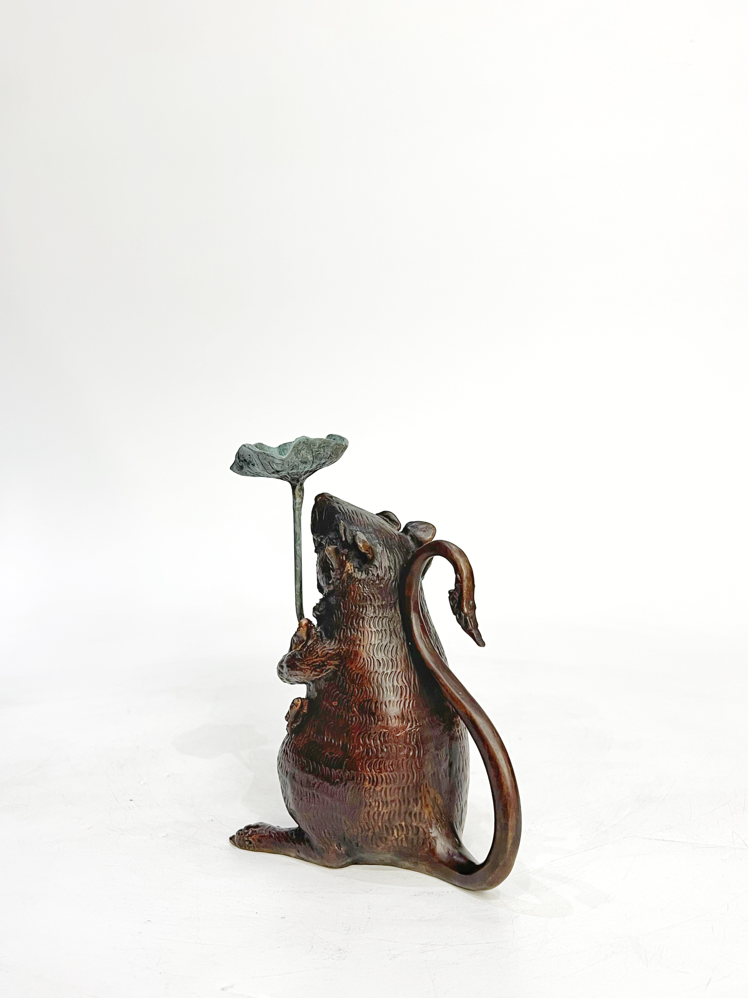 หนูมุสิกะ (ถือใบบัว วางกำยาน)