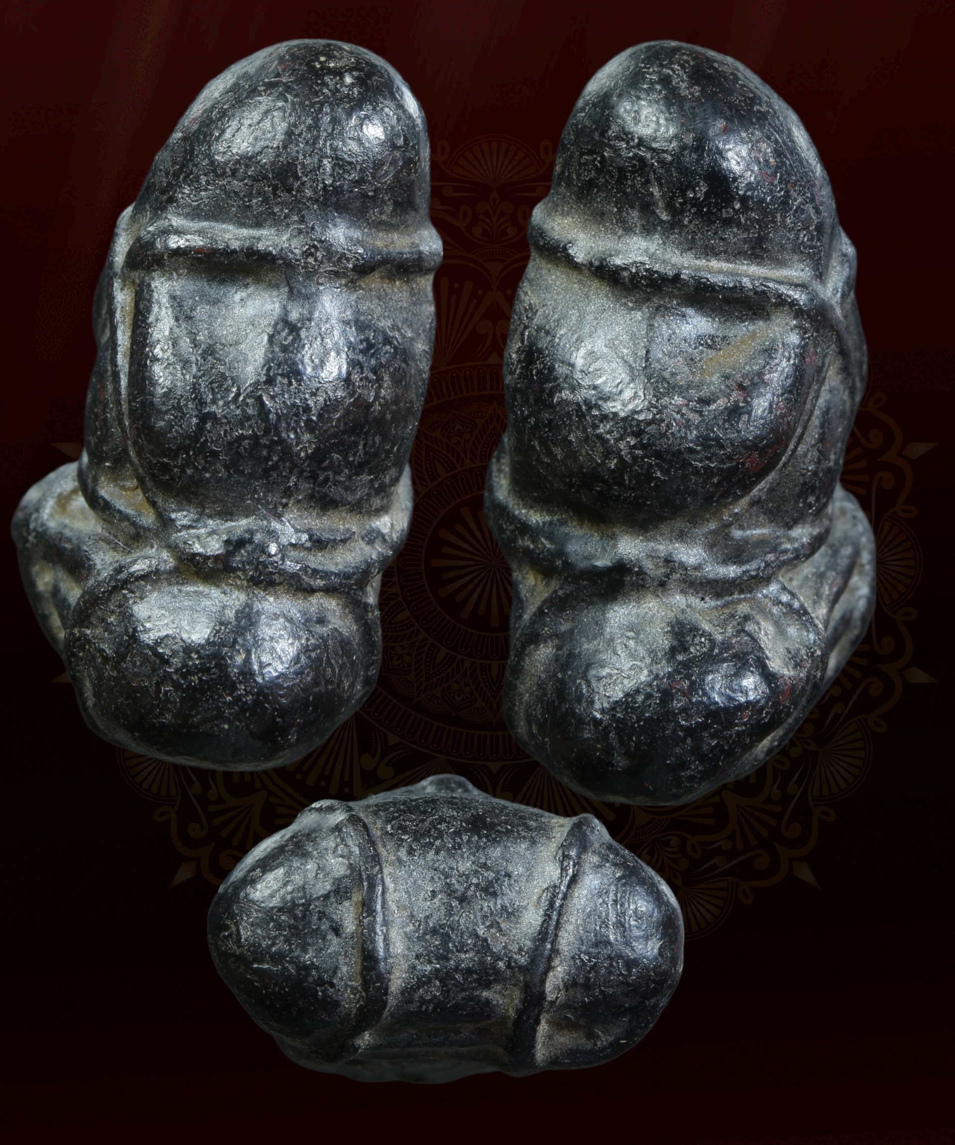 พระปิดตาผูกเชือก เนื้อผงคลุกรัก