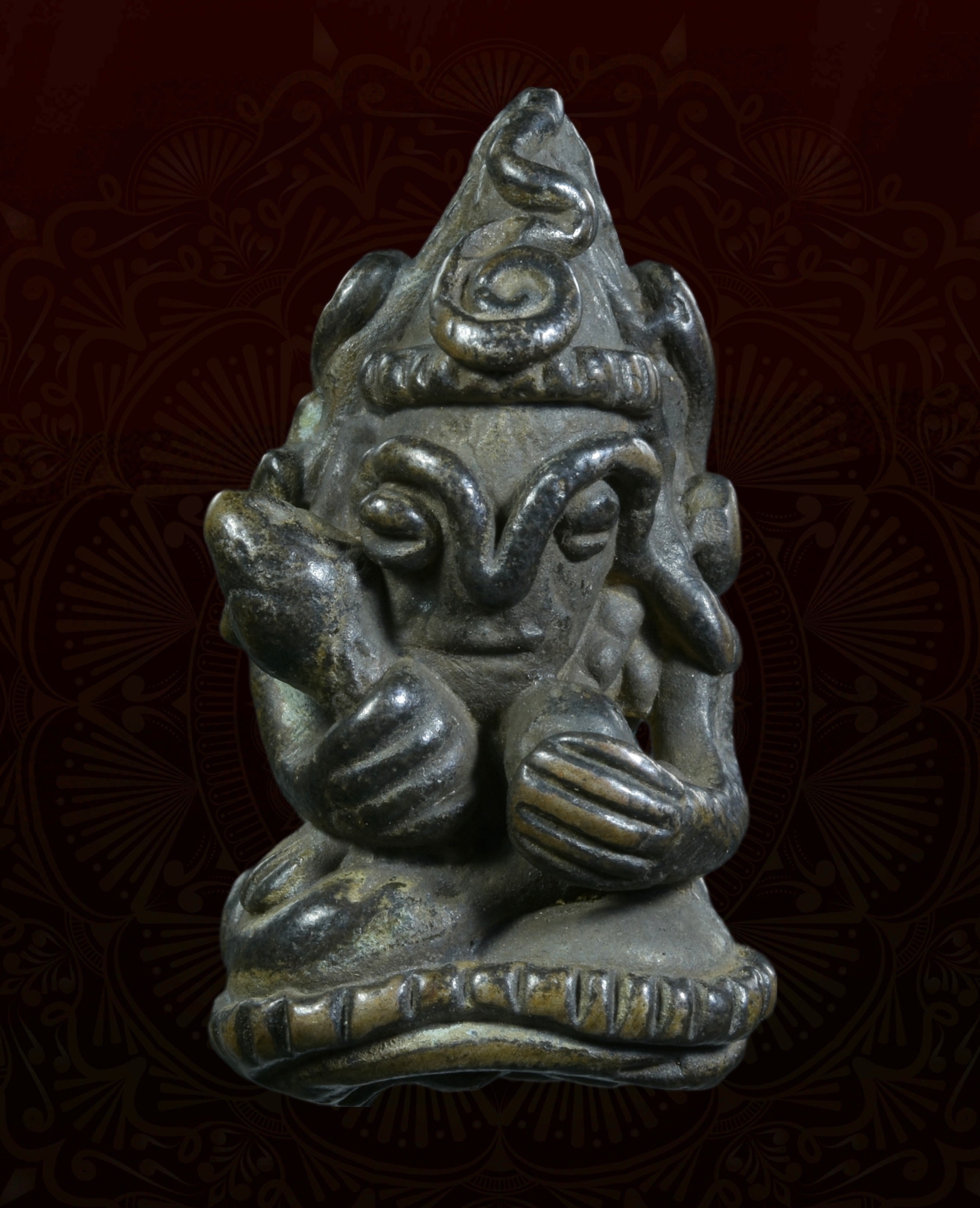 พระอุปคุตเขมร ถือดอกบัว หลังยันต์