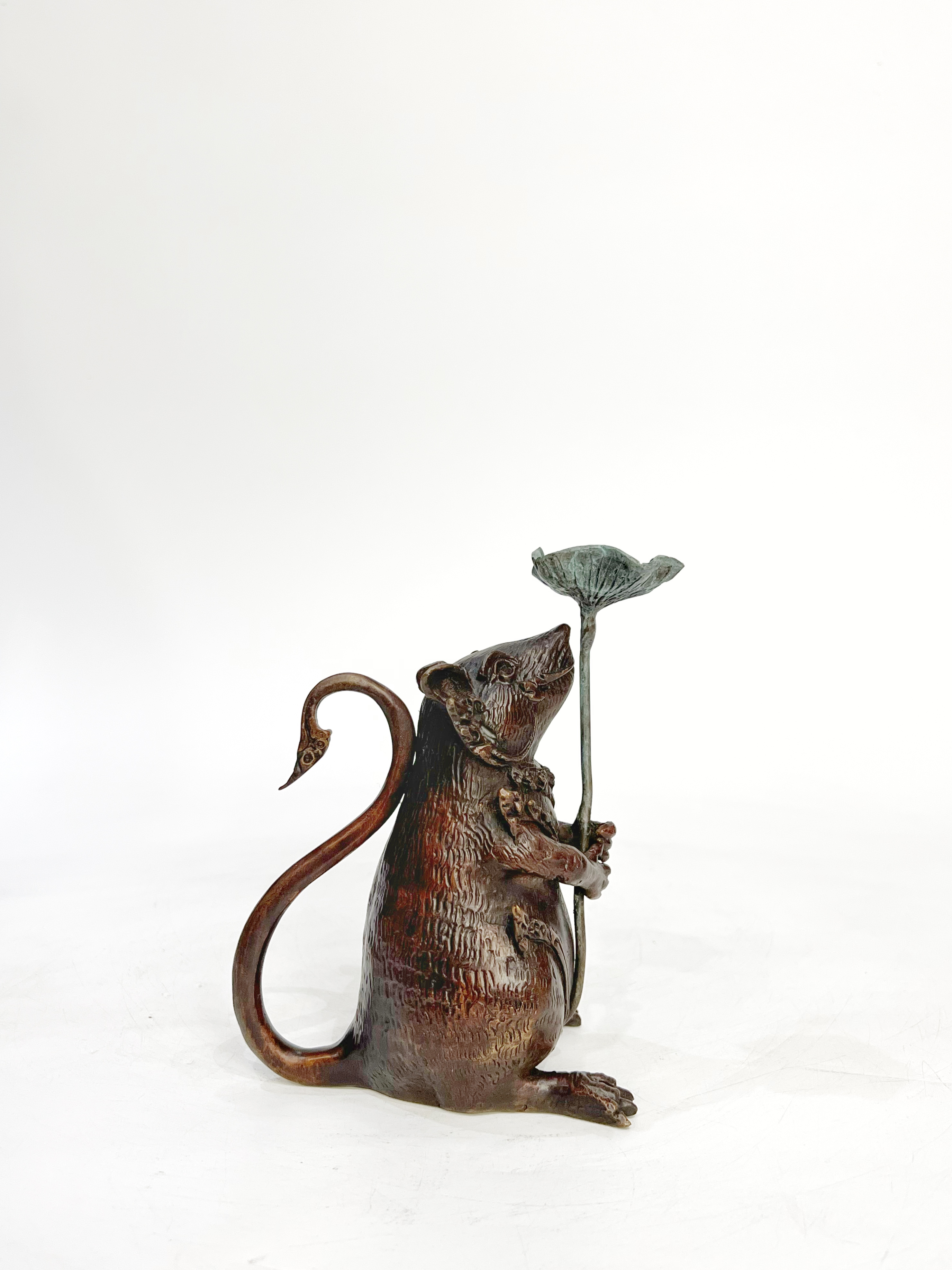 หนูมุสิกะ (ถือใบบัว วางกำยาน)