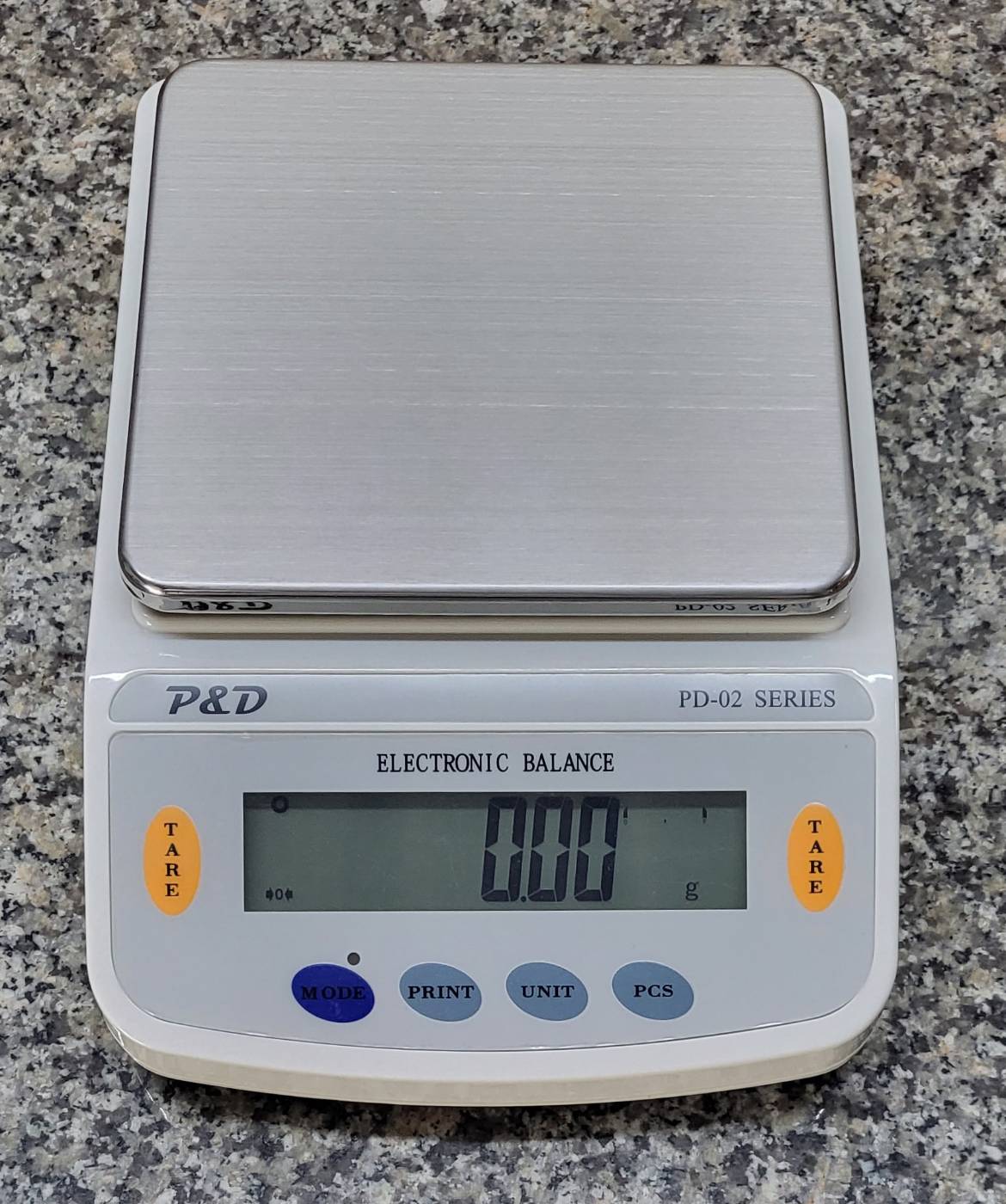 เครื่องชั่งละเอียด 5200 g. ค่าละเอียด 0.01 g.