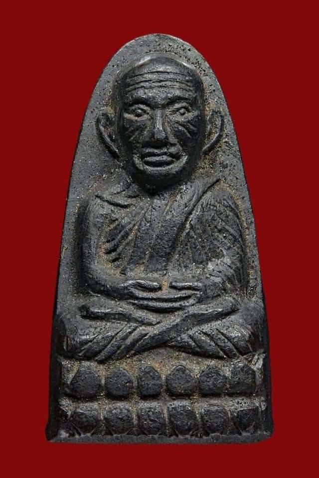หลวงปู่ทวดหลังหนังสือพิมพ์เล็ก ว.จุด ปี 2505
