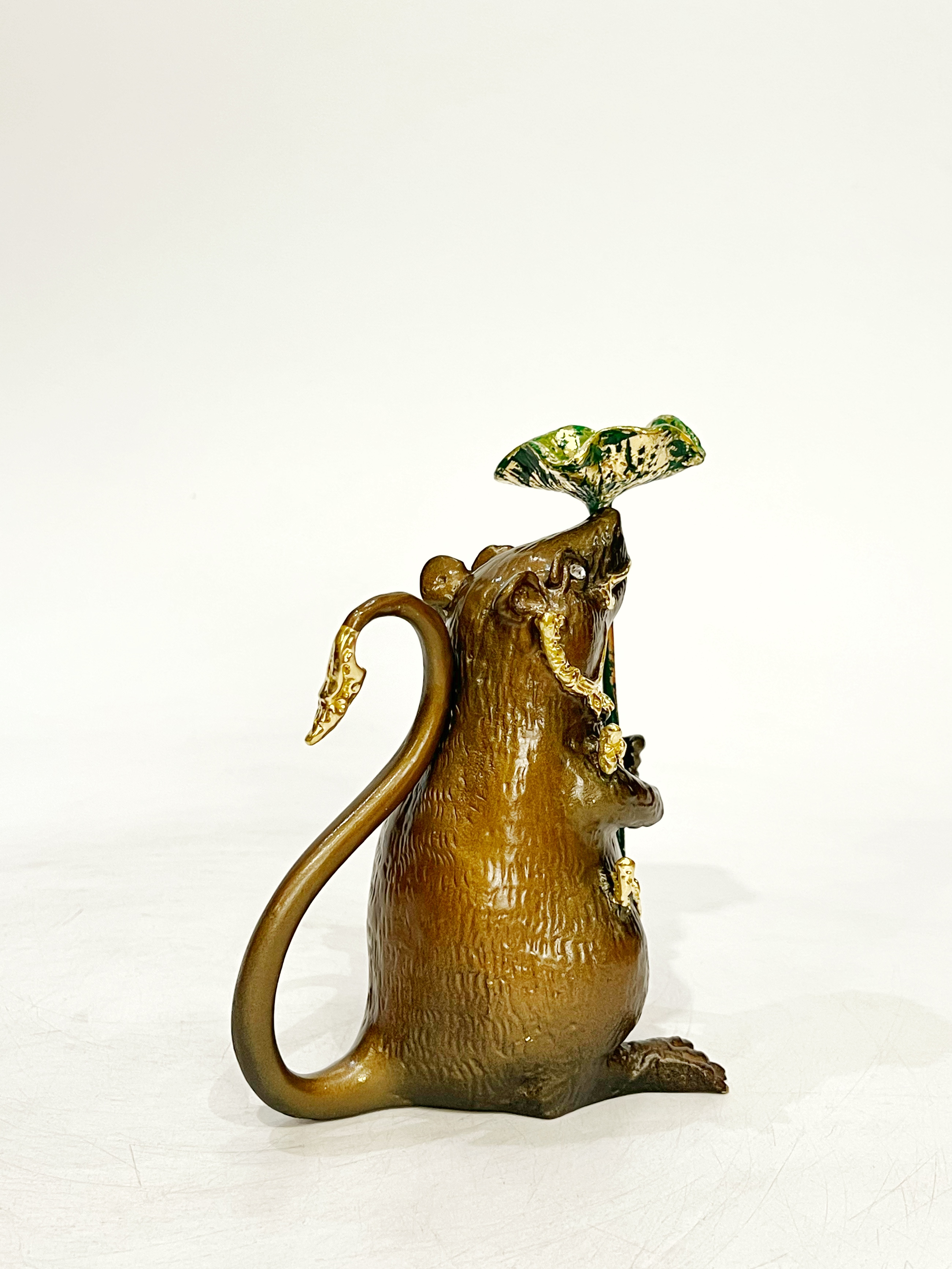 หนูมุสิกะ (ถือใบบัว วางกำยาน)