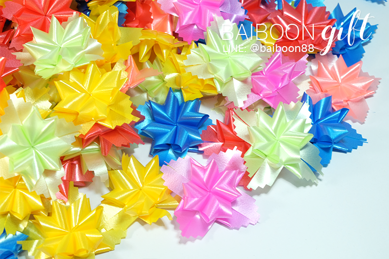 เหรียญโปรยทานพิกุล คละสี 100 ชิ้น