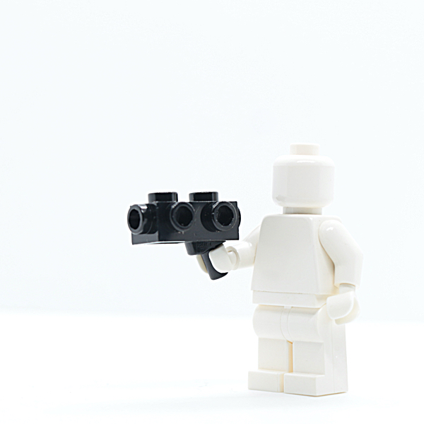 Gun, Blaster 1 x 2 x 2/3 with Studs on Sides and Handle