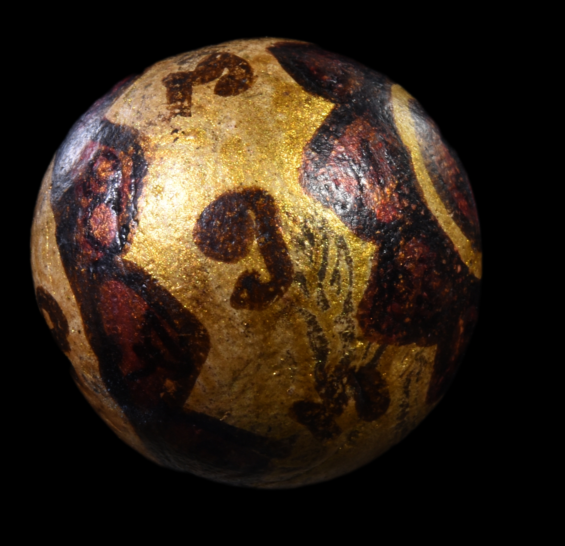 ลูกอมเนื้อผง ปิดทอง ลงยันต์