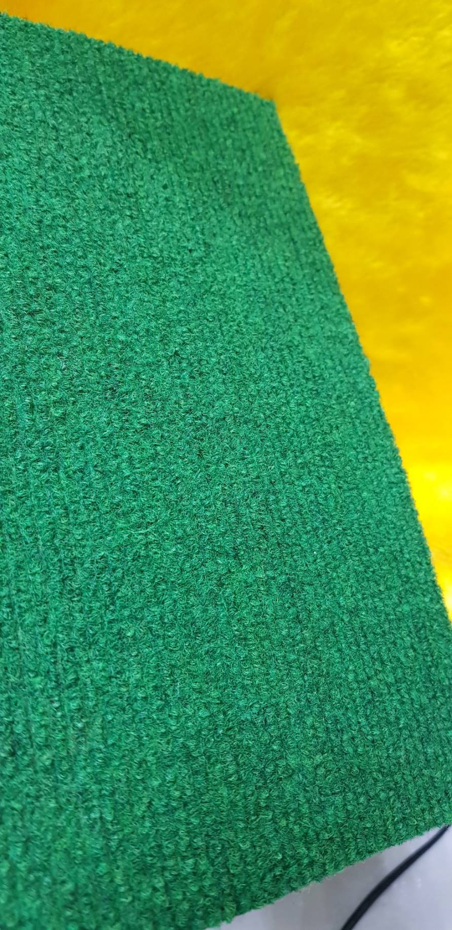 พรมขนห่วง ชนิดพรมอัดลอน พรมลูกฟูก สีเขียวปนดำ