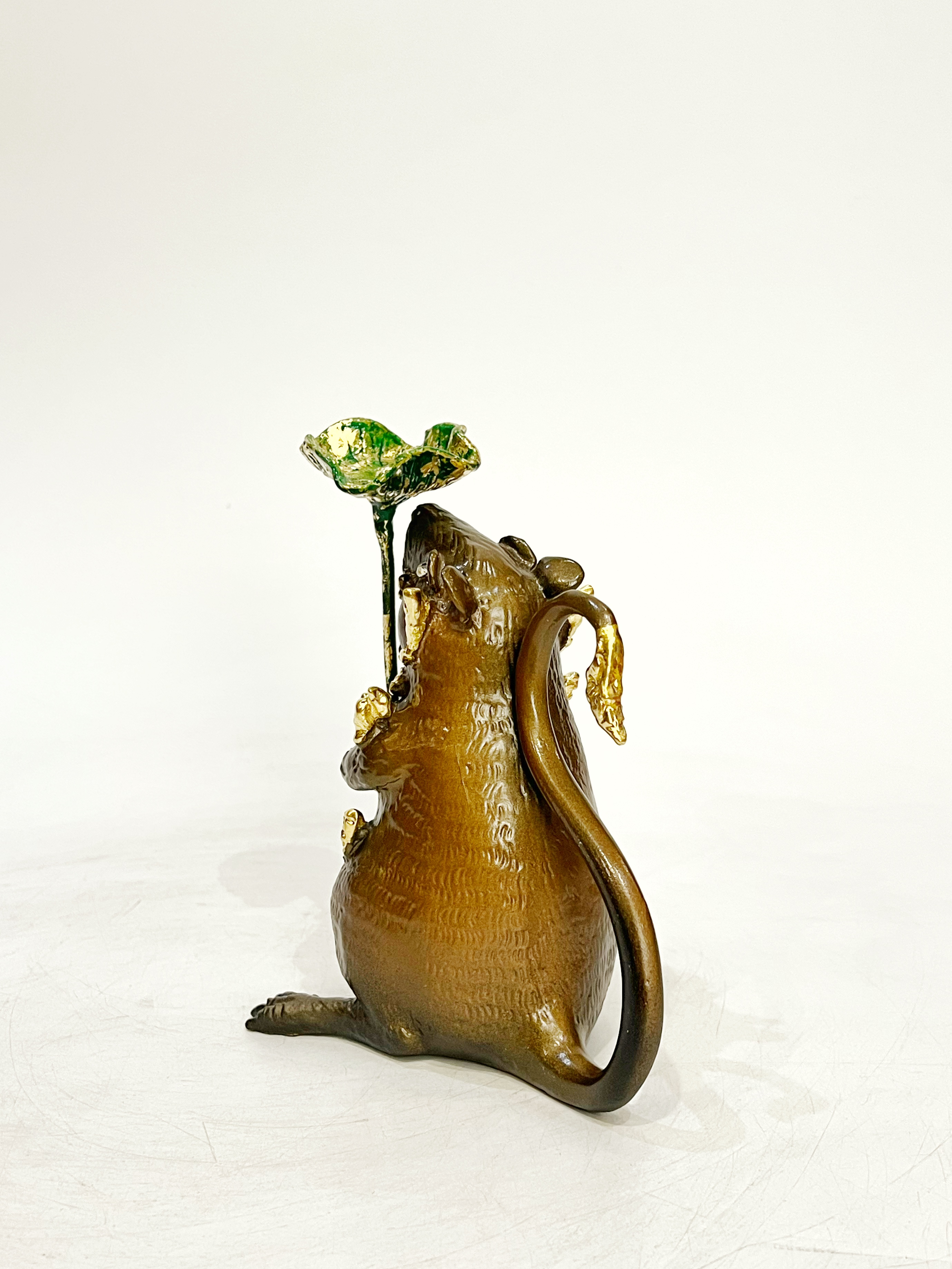 หนูมุสิกะ (ถือใบบัว วางกำยาน)