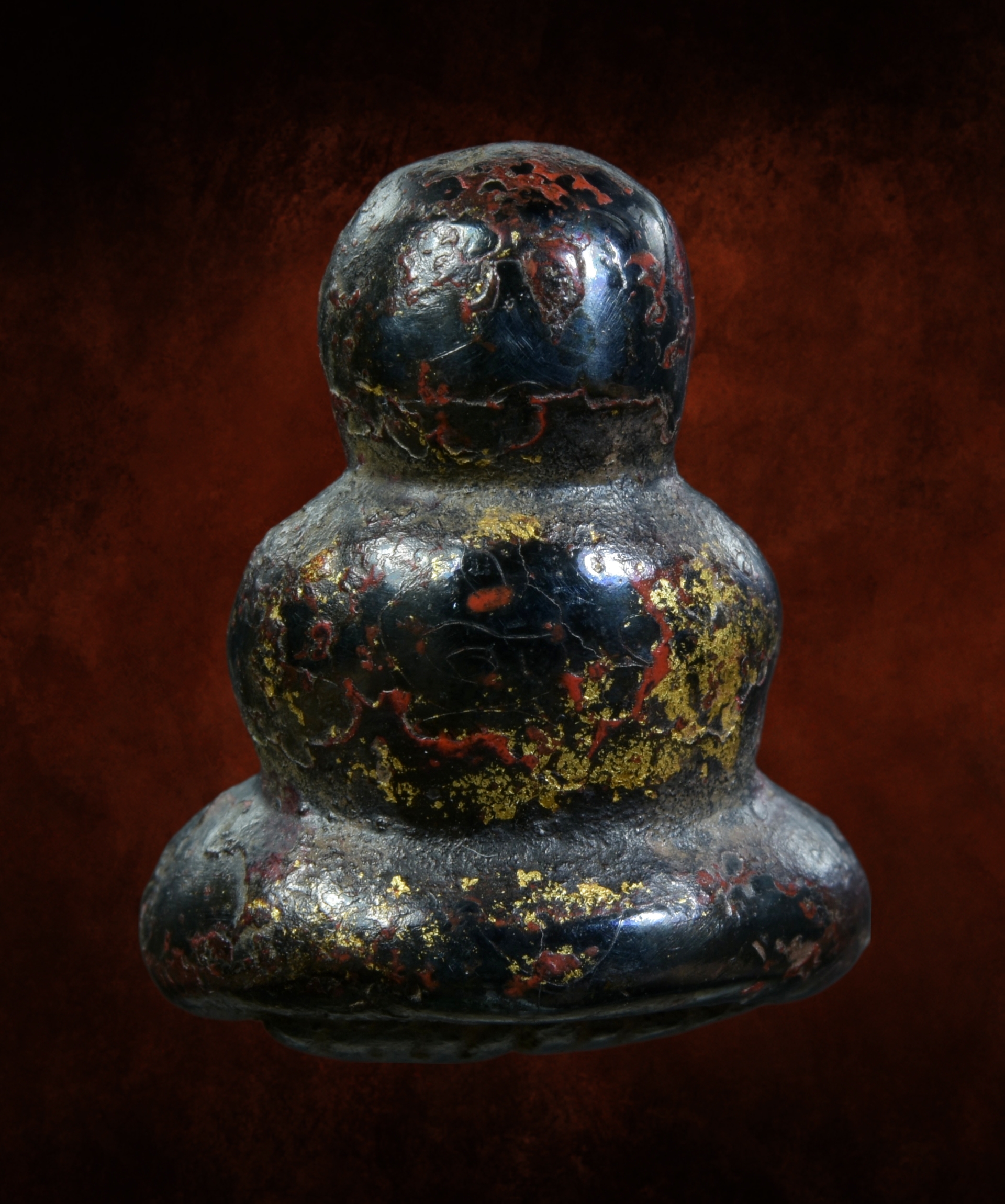 พระปิดตาหลวงพ่อปล้อง เนื้อเมฆพัตร