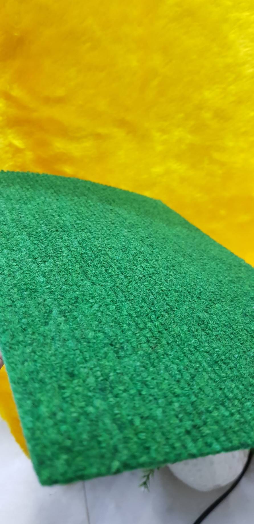 พรมขนห่วง ชนิดพรมอัดลอน พรมลูกฟูก สีเขียวปนดำ